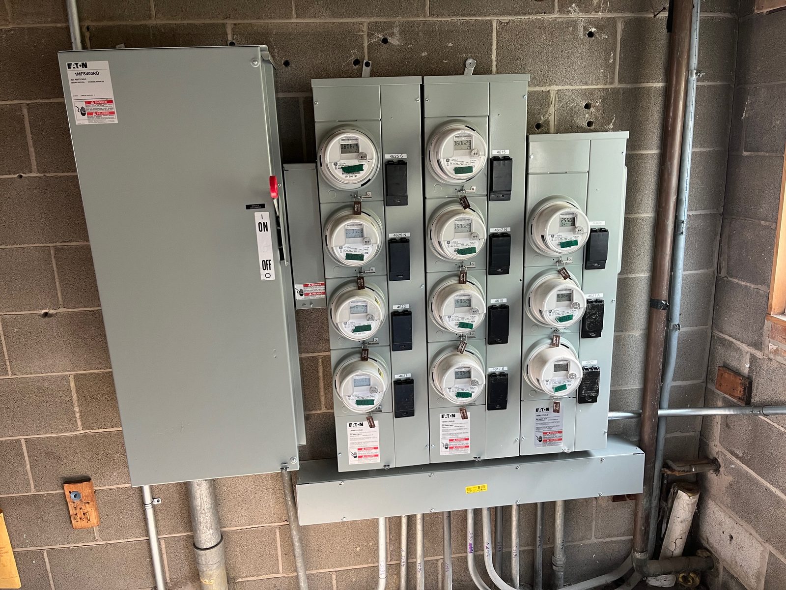 Twelve-meter bank with main service disconnect after replacement