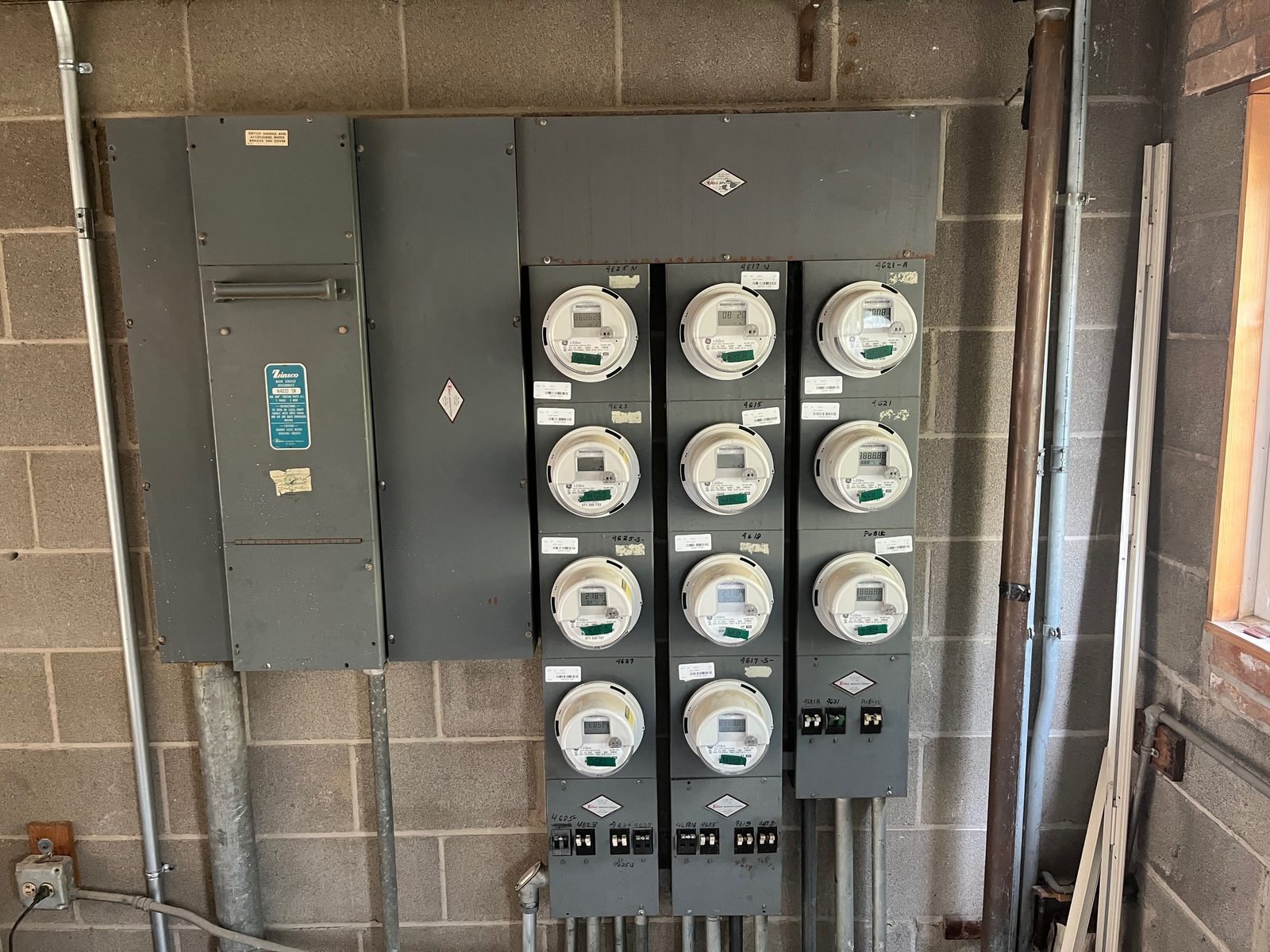 Older twelve-meter service equipment before replacement
