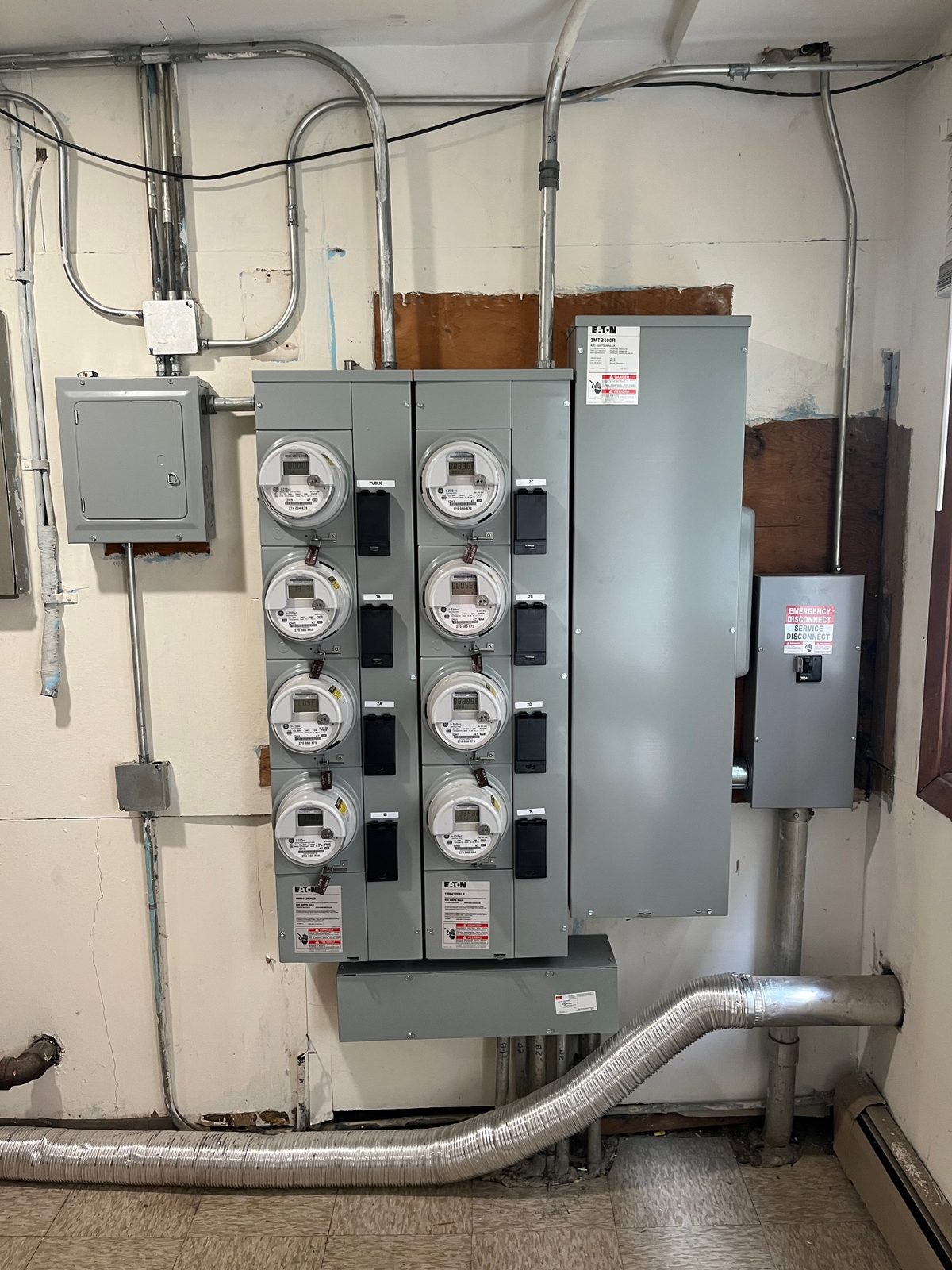 Eight-meter service with main enclosure and emergency disconnect